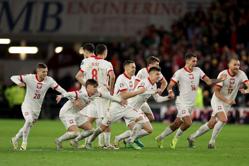 The players of Poland celebrate after victory in the penalty shoot out during the UEFA EURO 2024 Play-Offs Final match between Wales and Poland at Cardiff City Stadium on March 26, 2024 in Cardiff, Wales.