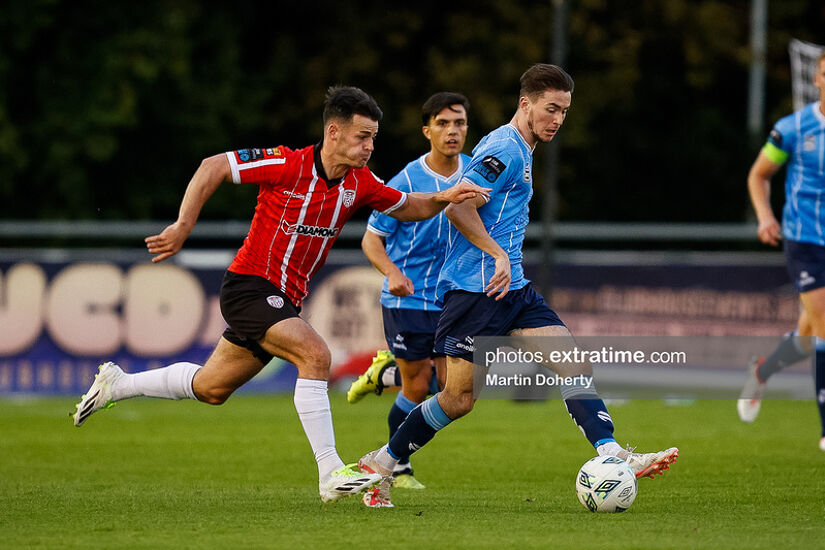 Danny Mullan, City's opening goalscorer, challenging Daniel Norris for the ball