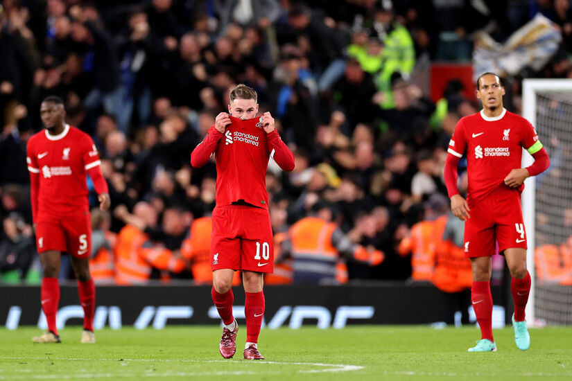 Alexis Mac Allister of Liverpool looks dejected after Gianluca Scamacca of Atalanta BC (not pictured) scores his team's second goal during the UEFA Europa League 2023/24 Quarter-Final first leg between Liverpool and Atalanta
