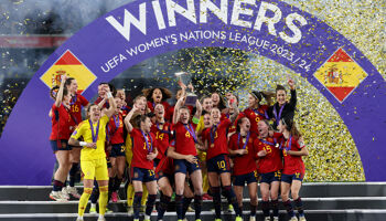 Spain celebrate as Irene Paredes of Spain lifts UEFA Women's Nations League trophy after her team's victory during the UEFA Women's Nations League 2024 Final match between Spain and France at Estadio La Cartuja on February 28, 2024 in Seville, Spain.