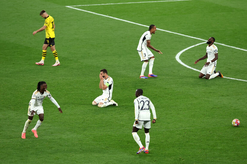 Eduardo Camavinga and Eder Militao of Real Madrid and teammates celebrate at full time following the team's victory during the UEFA Champions League 2023/24 Final match between Borussia Dortmund and Real Madrid CF at Wembley Stadium