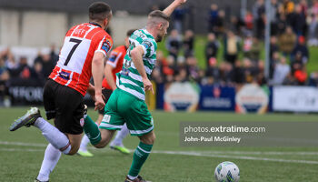 Jack Byrne points the way ahead of Michael Duffy in Rovers' 2-0 win in Derry in May