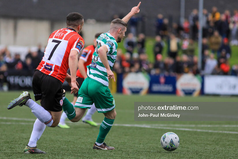 Jack Byrne points the way ahead of Michael Duffy in Rovers' 2-0 win in Derry in May