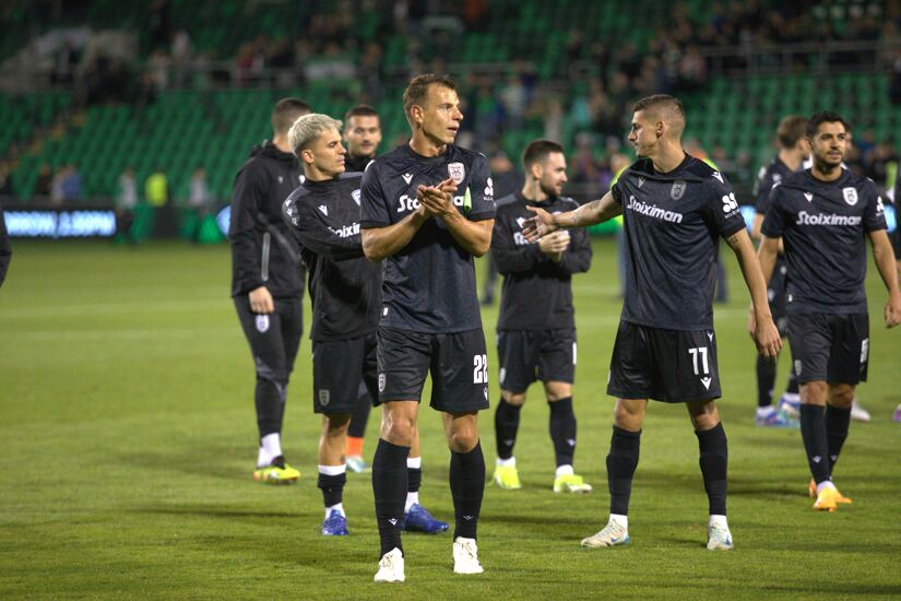 PAOK players, led by #22 Stefan Schwab, applaud the travelling fans following their 2-0 victory at Tallaght Stadium on August 29th, 2024.