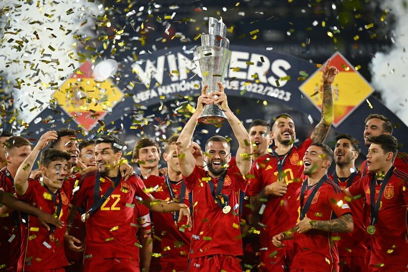 Nacho of Spain lifts the trophy after his team's victory in the UEFA Nations League 2022/23 final match over Croatia in June 2023 in Rotterdam
