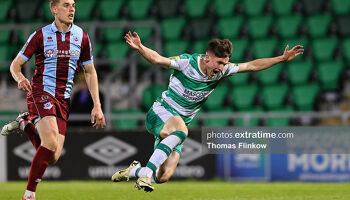 Johnny Kenny of Shamrock Rovers FC in action against Jack Keaney of Drogheda United FC during the SSE Airtricity Men's Premier Division match between Shamrock Rovers FC and Drogheda United FC at Tallaght Stadium, Dublin on April 29, 2024