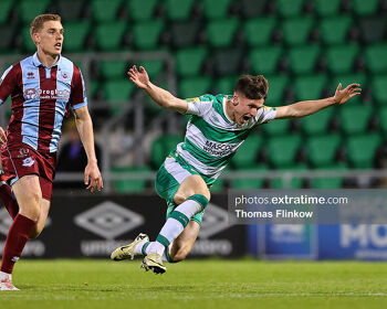 Johnny Kenny of Shamrock Rovers FC in action against Jack Keaney of Drogheda United FC during the SSE Airtricity Men's Premier Division match between Shamrock Rovers FC and Drogheda United FC at Tallaght Stadium, Dublin on April 29, 2024