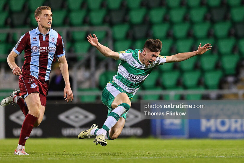 Johnny Kenny of Shamrock Rovers FC in action against Jack Keaney of Drogheda United FC during the SSE Airtricity Men's Premier Division match between Shamrock Rovers FC and Drogheda United FC at Tallaght Stadium, Dublin on April 29, 2024