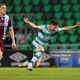 Johnny Kenny of Shamrock Rovers FC in action against Jack Keaney of Drogheda United FC during the SSE Airtricity Men's Premier Division match between Shamrock Rovers FC and Drogheda United FC at Tallaght Stadium, Dublin on April 29, 2024