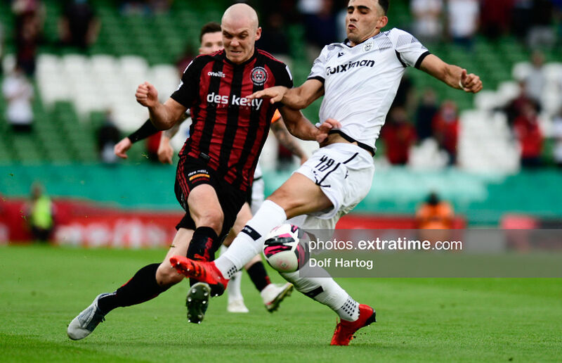 Georgie Kelly challenges Giannis Michailidis for the ball at the Aviva Stadium on Tuesday, 3 August 2021.
