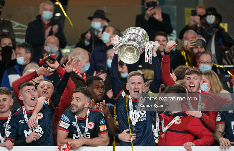 Ian Bermingham lifts the cup for St Patrick's Athletic