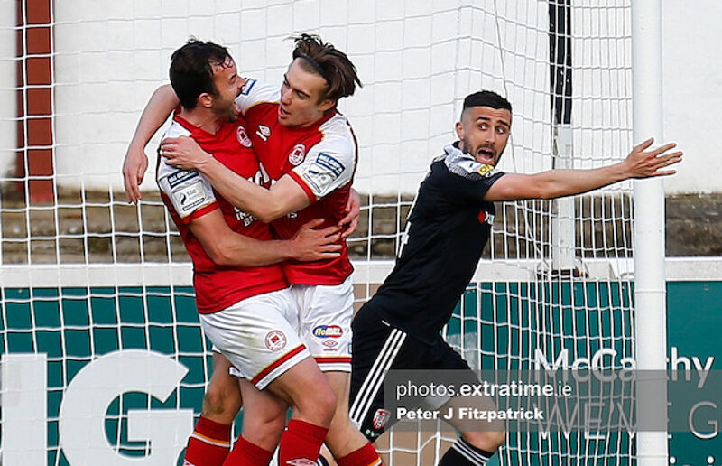 Danny Lafferty of Derry protests after Robbie Benson's goal for the Athletic