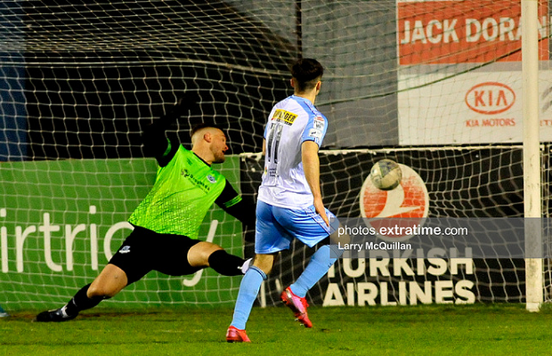 Dan Hawkins opens the scoring for Shelbourne, smashing the ball past Colin McCabe during their 2-0 win over Drogheda United at Head in the Game Park on Friday, 25th February 2022.