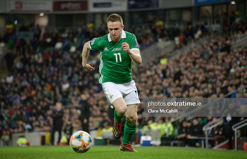 Shane Ferguson in action for Northern Ireland against Estonia in 2019