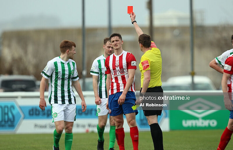 Sean McSweeney receives a red card from referee Oliver Moran