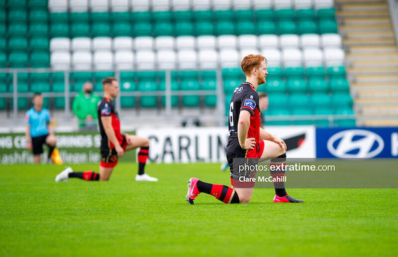 Hugh Douglas takes the knee in Tallaght Stadium in Drogheda's game against Rovers II in the First Division last season