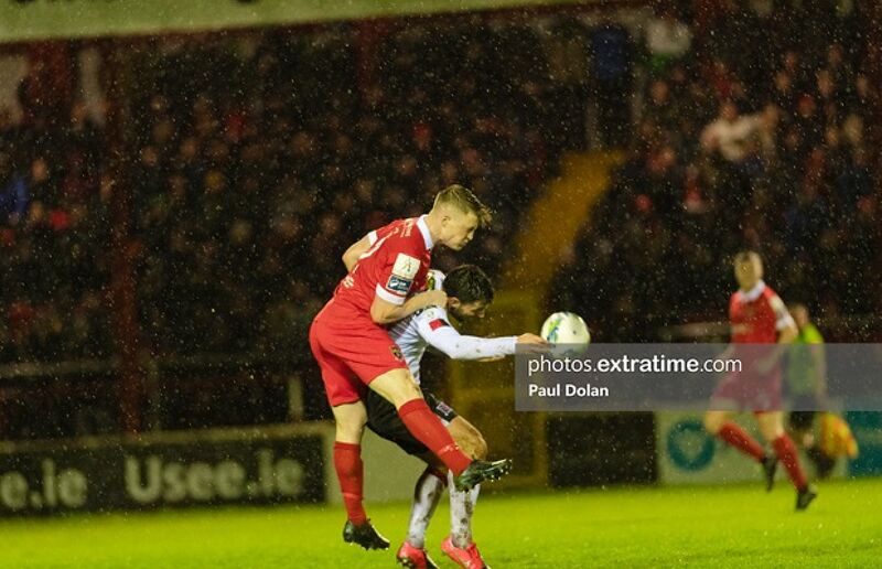 Daniel O'Reilly Shelbourne FC outjumps Patrick Hoban Dundalk FC