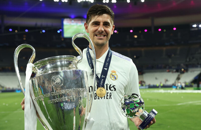 Thibaut Courtois with the Champions League trophy, winners medal and man-of-the-match award